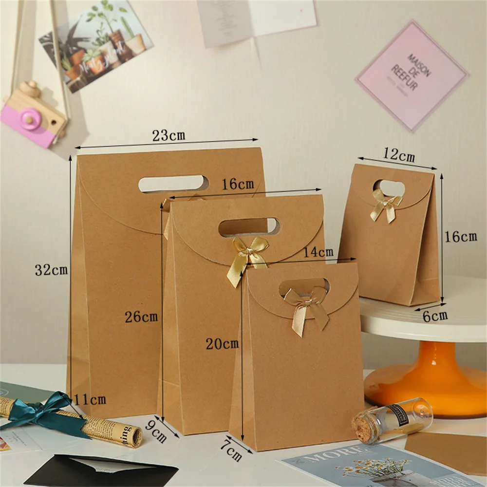 1PC Kraft Paper Gift Bags Bow Knot Tote Bag Festival Wedding Party Cookie Candy Packaging Box Ramadan Favors Supplies
1PC Kraft Paper Gift Bags Bow Knot Tote Bag Festival Wedding Party Cookie Candy Packaging Box Ramadan Favors Supplies