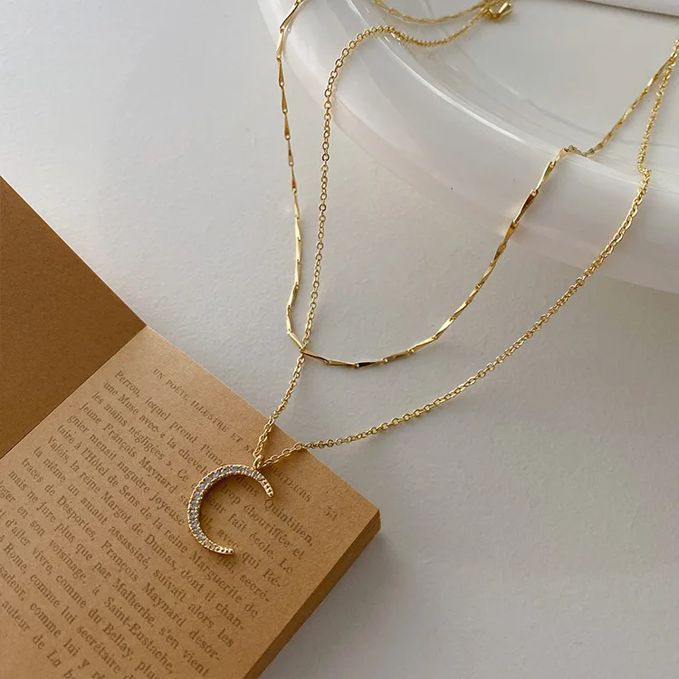 Korean Fairy Jewelry 14k Gold Shiny Moon Stars Zircon Pendant Double Layered Clavicle Chain Necklace for Women Elegant Accessory
Korean Fairy Jewelry 14k Gold Shiny Moon Stars Zircon Pendant Double Layered Clavicle Chain Necklace for Women Elegant Accessory