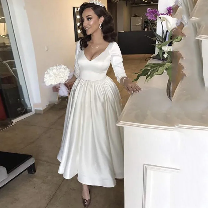 Sexy V Neck Short Wedding Dress 3/4 Long Sleeve White /Ivory Satin A-line Ankle Length Bride Gowns Backless Beach Wedding Gown
Sexy V Neck Short Wedding Dress 3/4 Long Sleeve White /Ivory Satin A-line Ankle Length Bride Gowns Backless Beach Wedding Gown