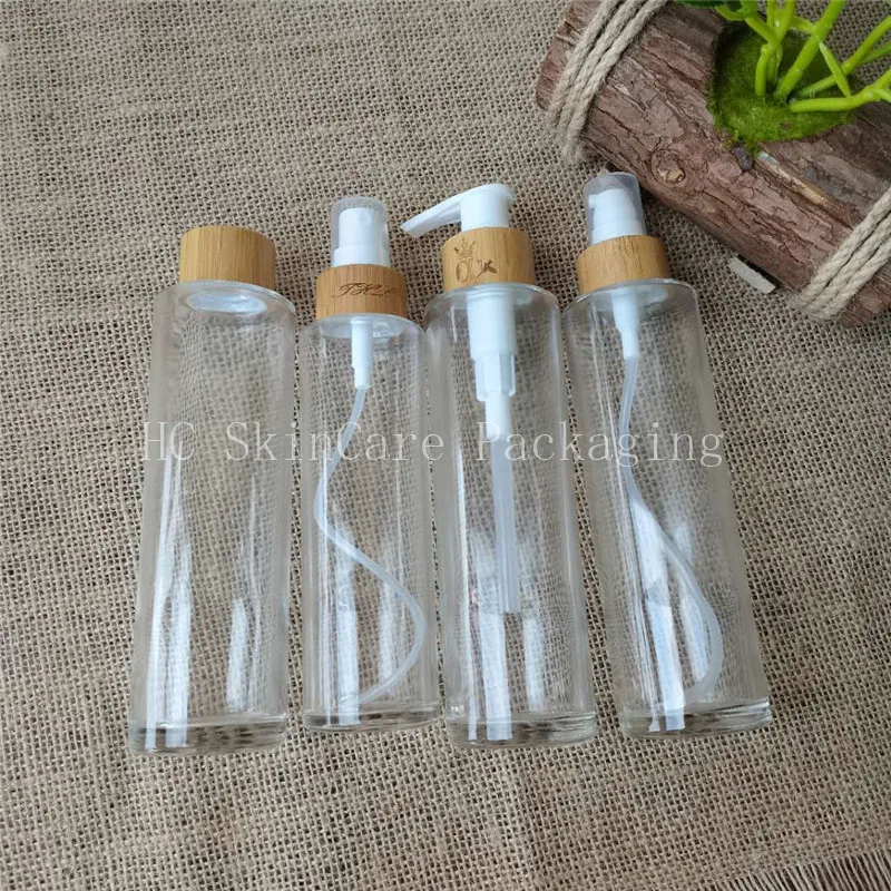 Hot sale flat shoulder clear glass lotion bottle with 24/410 bamboo lid and pump cosmetic packaging bottle for oil
Hot sale flat shoulder clear glass lotion bottle with 24/410 bamboo lid and pump cosmetic packaging bottle for oil