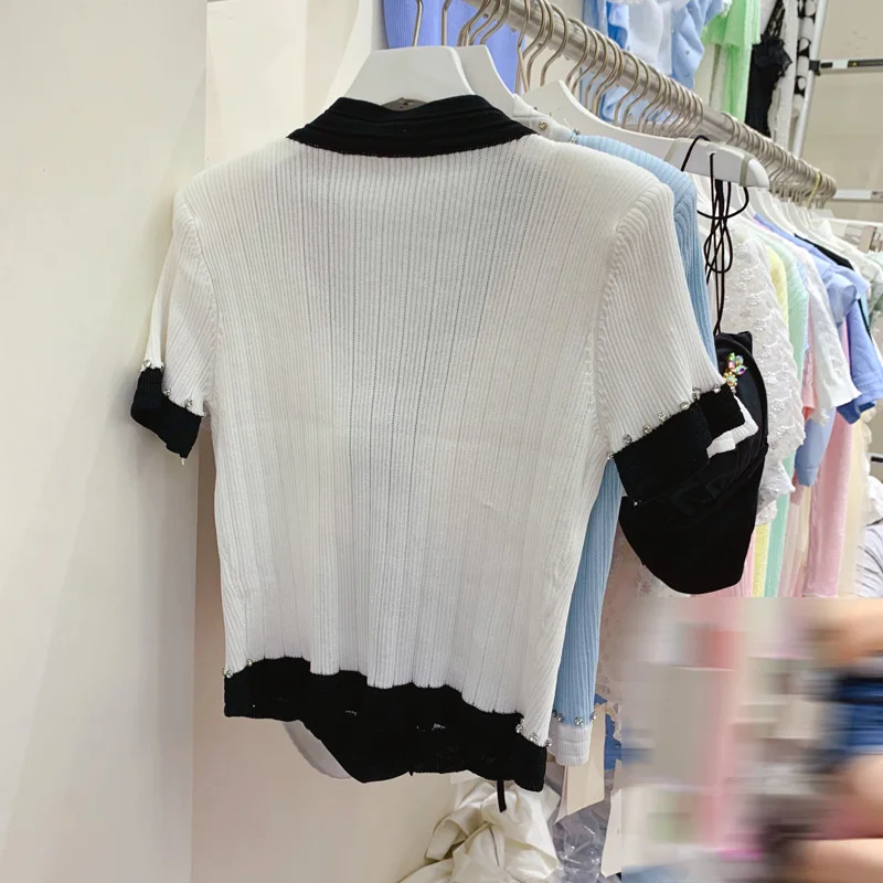 Lady Summer Vintage Sweet Bow Short Sleeve Knitting Tops Streetwear Single Breasted V-Neck Cardigan Sweater Elegant Slim Sweater
Lady Summer Vintage Sweet Bow Short Sleeve Knitting Tops Streetwear Single Breasted V-Neck Cardigan Sweater Elegant Slim Sweater