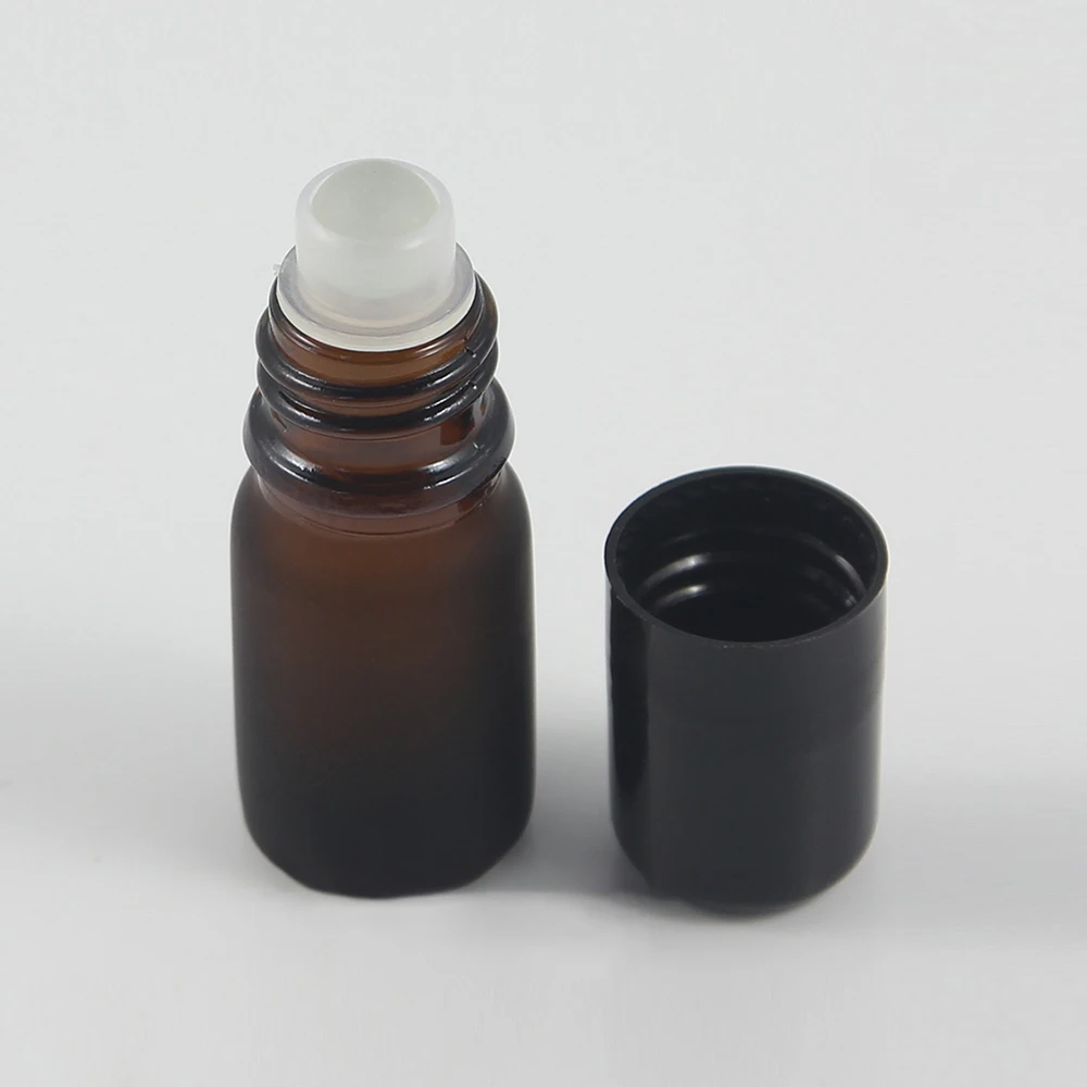 Empty 5ml frosted amber sample perfume glass roll on bottle with glass/stainless ball,cosmetic essential oil 5ml small bottle
Empty 5ml frosted amber sample perfume glass roll on bottle with glass/stainless ball,cosmetic essential oil 5ml small bottle