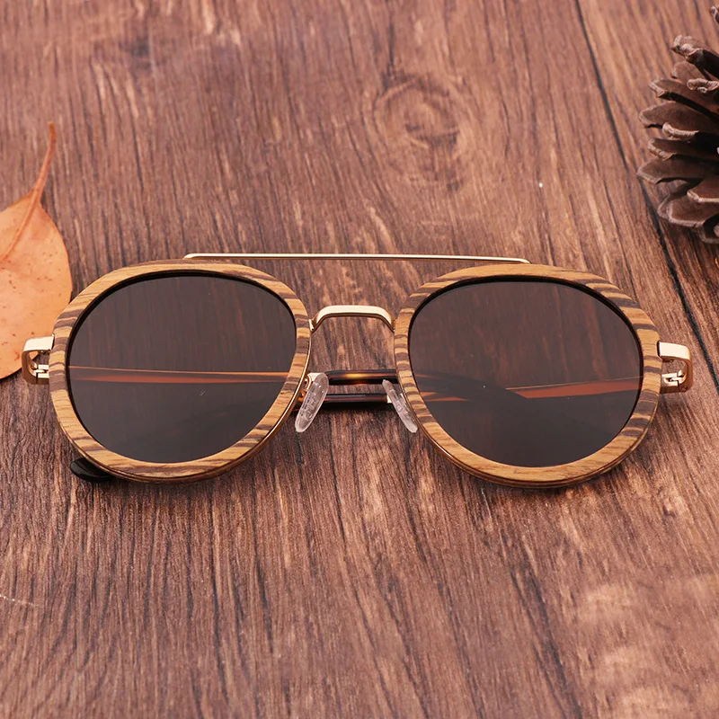 Брендовые дизайнерские деревянные бамбуковые солнцезащитные очки для женщин и мужчин, большие солнцезащитные очки в стиле ретро с поляризационными линзами, ручная работа UV400
Брендовые дизайнерские деревянные бамбуковые солнцезащитные очки для женщин и мужчин, большие солнцезащитные очки в стиле ретро с поляризационными линзами, ручная работа UV400