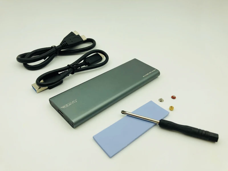 M.2 NVMe USB 3.1 Type C SSD Mobile Box for Hard Disk External HDD Enclosure M Key PCI-E NVMe SSD Case for 2230 2242 2260 2280
M.2 NVMe USB 3.1 Type C SSD Mobile Box for Hard Disk External HDD Enclosure M Key PCI-E NVMe SSD Case for 2230 2242 2260 2280
