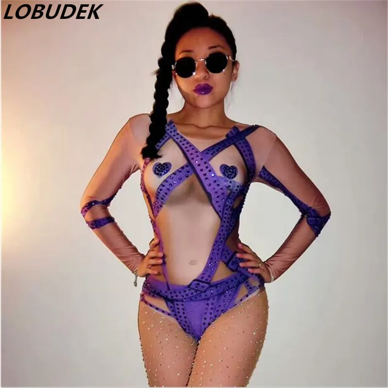 Purple Rhinestones Bodysuit Crystal Tights For Pole Dance Acrobatic Performance Leotard Women DJ Dancer Singer Sexy Stage Wear
Purple Rhinestones Bodysuit Crystal Tights For Pole Dance Acrobatic Performance Leotard Women DJ Dancer Singer Sexy Stage Wear
