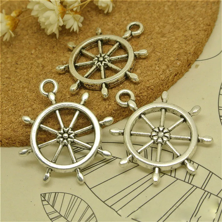 Hot Selling 100 Pieces/Lot 27mm*23mm Antique Silver Plated Boat Helm Rudder Charms
Hot Selling 100 Pieces/Lot 27mm*23mm Antique Silver Plated Boat Helm Rudder Charms