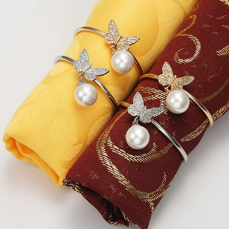 6/PCS new Christmas decorations hotel banquet table set with zircon butterfly and pearl napkin ring
6/PCS new Christmas decorations hotel banquet table set with zircon butterfly and pearl napkin ring