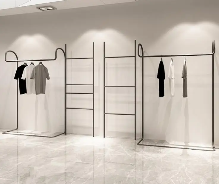 Iron clothing floor-standing side-mounted display rack curved clothing store shelf hanger multi-function trapezoidal pants rack.
Iron clothing floor-standing side-mounted display rack curved clothing store shelf hanger multi-function trapezoidal pants rack.