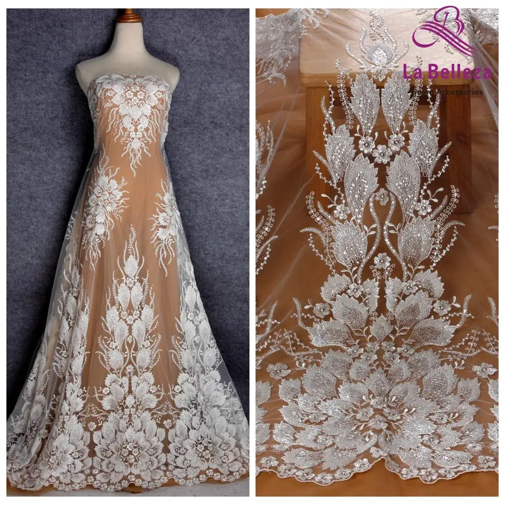 La Belleza new heavy beaded wedding dress lace fabric off white beads sequins lace fabric big flowers pattern lace 1 yard
La Belleza new heavy beaded wedding dress lace fabric off white beads sequins lace fabric big flowers pattern lace 1 yard