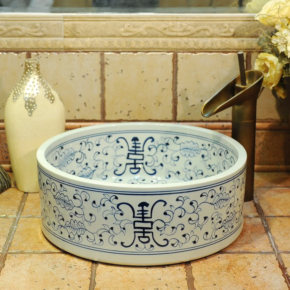 Фабрика Jingdezhen непосредственно художественная керамическая художественная раковина с ручной росписью
Фабрика Jingdezhen непосредственно художественная керамическая художественная раковина с ручной росписью