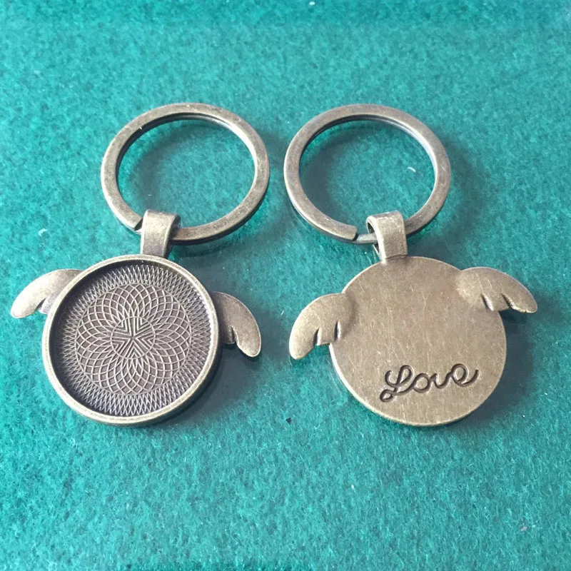 6PCS/Lot Vintage Key Charm 25mm Angel Wing Round Cabochon Setting DIY Blank Cabochon Handmade Key Ring
6PCS/Lot Vintage Key Charm 25mm Angel Wing Round Cabochon Setting DIY Blank Cabochon Handmade Key Ring