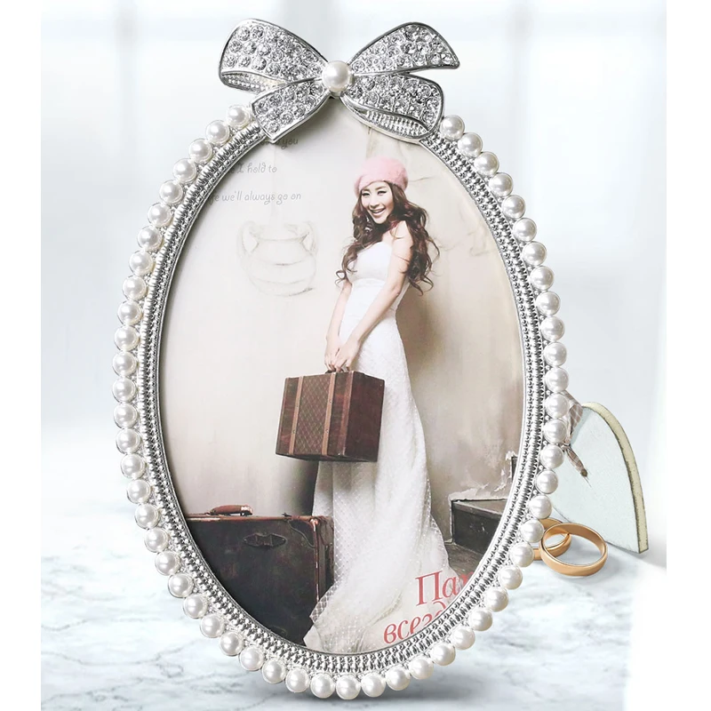 Europe Creative photo frame 3inch 6inch 7inch luxurious Metal pearl photo frame table top frames wedding Home decoration
Europe Creative photo frame 3inch 6inch 7inch luxurious Metal pearl photo frame table top frames wedding Home decoration