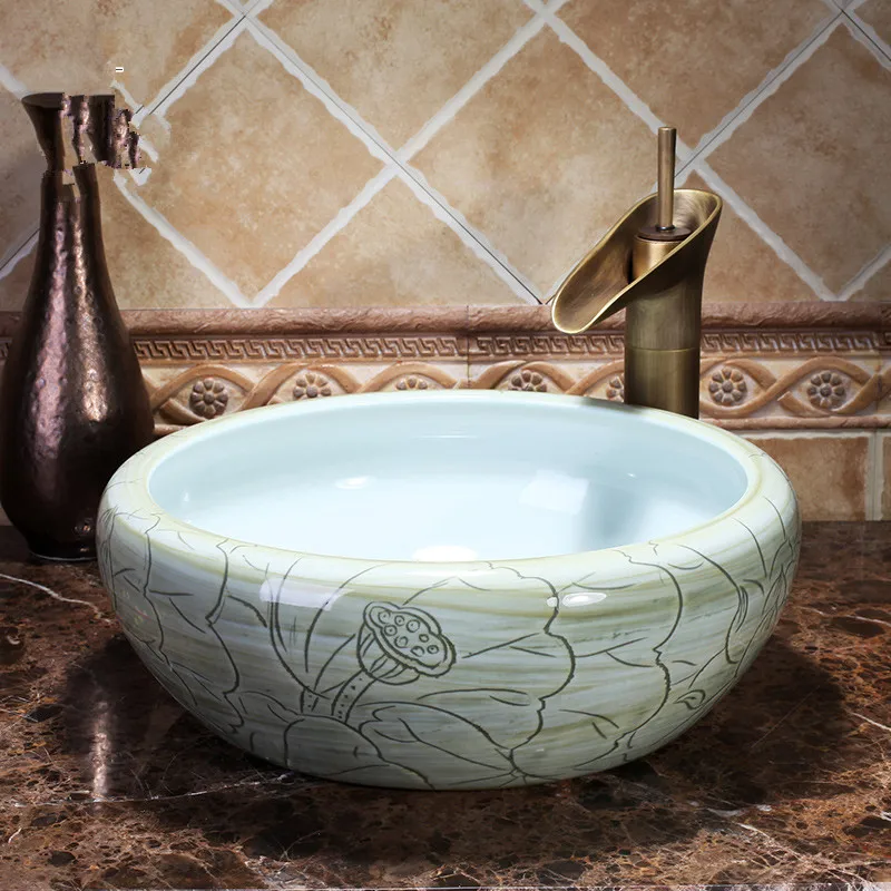China Artistic Handmade Ceramic wash basin Round Counter top wash basin bowl
China Artistic Handmade Ceramic wash basin Round Counter top wash basin bowl