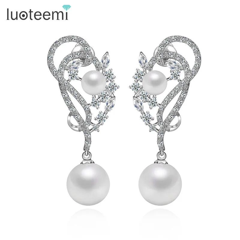 LUOTEEMI Brand Luxury Flower Shape Cubic Zirconia Imitation Pearl Drop Earring Trending Bridal Wedding Engagement Accessories 
LUOTEEMI Brand Luxury Flower Shape Cubic Zirconia Imitation Pearl Drop Earring Trending Bridal Wedding Engagement Accessories