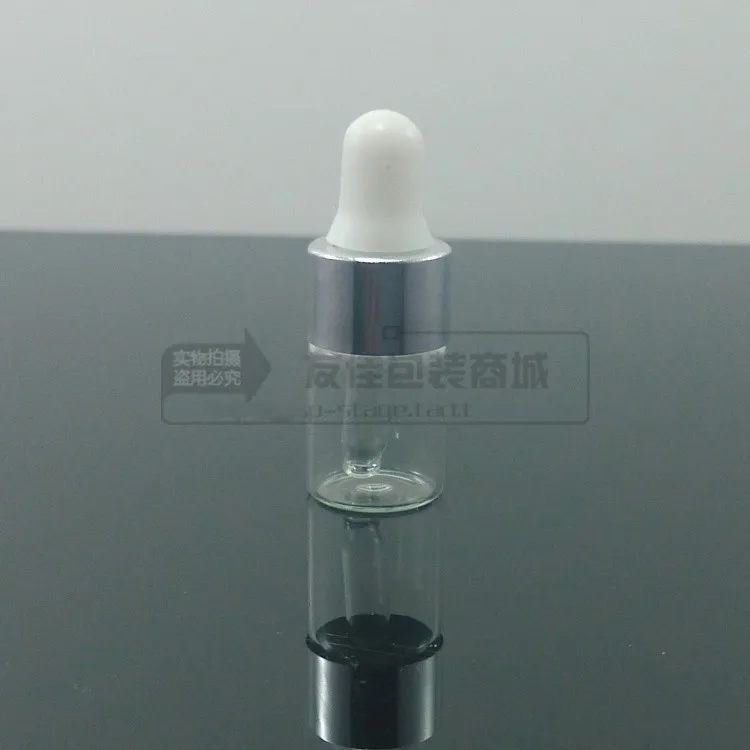 100pcs/lot 2ml clear/transparent Glass Essential Oil Bottle With silver ring+white rubber dropper lid, mini glass dropper bottle
100pcs/lot 2ml clear/transparent Glass Essential Oil Bottle With silver ring+white rubber dropper lid, mini glass dropper bottle