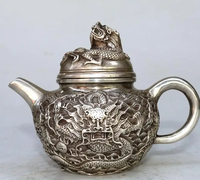 Antique old QingDynasty silver pot--dragon kettle ,handmade crafts,Decorationcollection&adornment,Free shipping
Antique old QingDynasty silver pot--dragon kettle ,handmade crafts,Decorationcollection&adornment,Free shipping