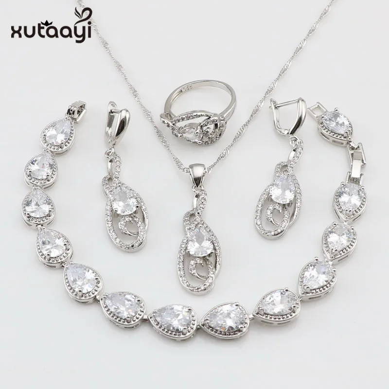XUTAAYI Серебряные Ювелирные наборы для женщин 2018 Новый Белый кубический цирконий ожерелье кулон Браслеты Серьги Кольца Бесплатная подарочная коробка
XUTAAYI Серебряные Ювелирные наборы для женщин 2018 Новый Белый кубический цирконий ожерелье кулон Браслеты Серьги Кольца Бесплатная подарочная коробка