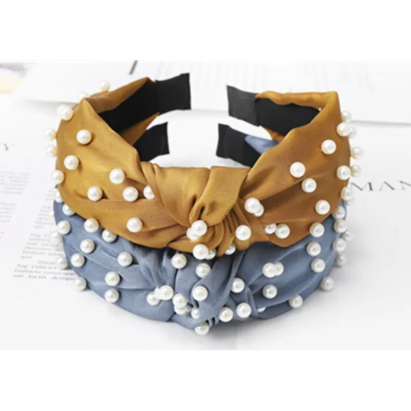 Женская повязка на голову с жемчугом, широкая повязка на голову, однотонная тканевая повязка на голову, женские аксессуары для волос, повязка на голову с жемчугом
Женская повязка на голову с жемчугом, широкая повязка на голову, однотонная тканевая повязка на голову, женские аксессуары для волос, повязка на голову с жемчугом