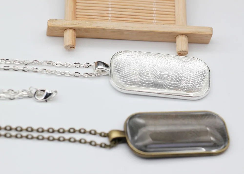 10kits 25X50mm Round Corner Rectangle Necklace Pendant Include Base+Glass+3x4mm 24Inch Rolo Chains For DIY Accessories Making
10kits 25X50mm Round Corner Rectangle Necklace Pendant Include Base+Glass+3x4mm 24Inch Rolo Chains For DIY Accessories Making