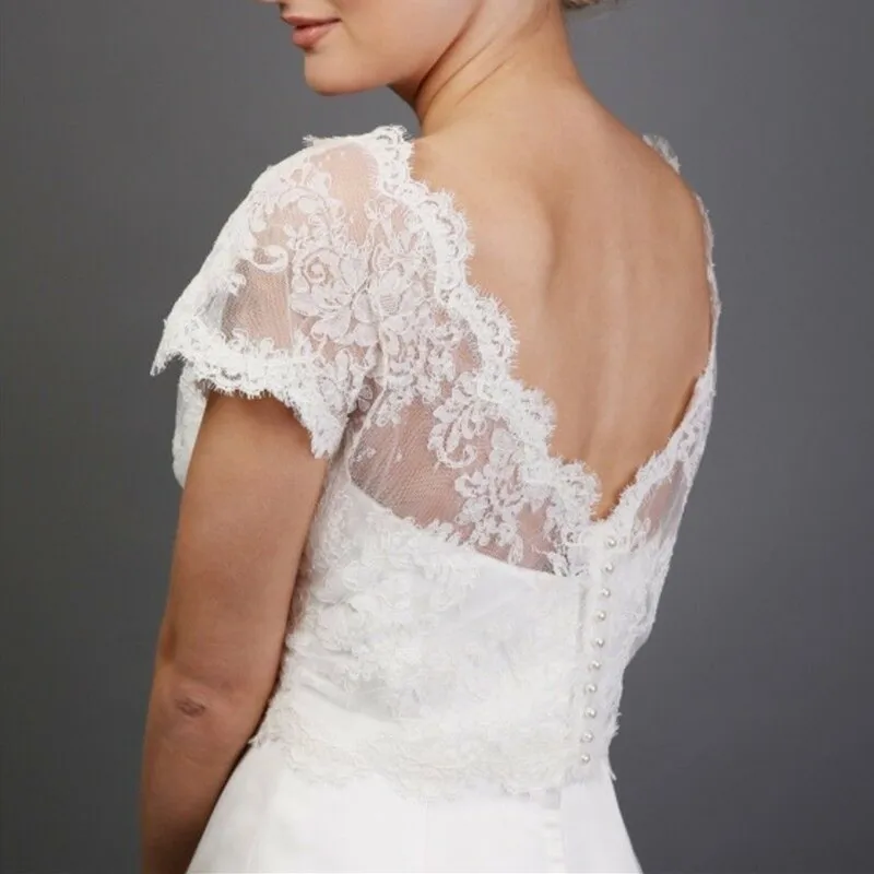 Sexy V Back White Ivory Wedding Jackets Bolero Topper Lace Applique Short Sleeve V Neck Custom Bridal Accessories
Sexy V Back White Ivory Wedding Jackets Bolero Topper Lace Applique Short Sleeve V Neck Custom Bridal Accessories