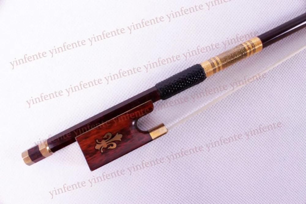New 4/4 Violin Bow get quality SnakeWood Bow string Golden Color Flower inlaid Pattern
New 4/4 Violin Bow get quality SnakeWood Bow string Golden Color Flower inlaid Pattern