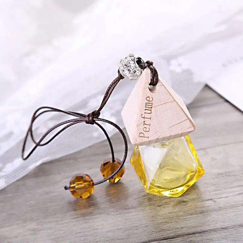 Glass Car Perfume Bottle with Wood Beautiful Cap Empty Refillable Bottle Hanging Cute Air Freshener Carrier LX6775
Glass Car Perfume Bottle with Wood Beautiful Cap Empty Refillable Bottle Hanging Cute Air Freshener Carrier LX6775