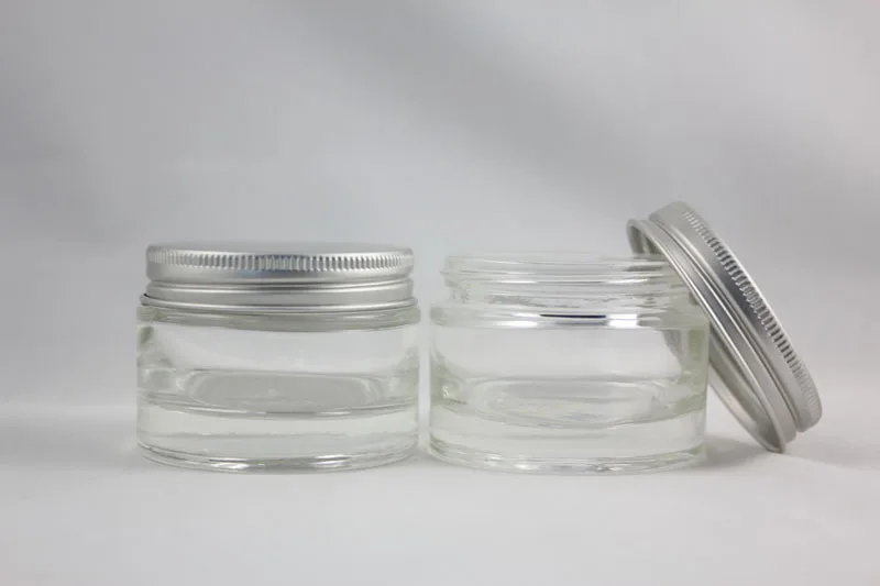 30pcs 50g clear glass cream jar with silver aluminum lid, empty 50g cosmetic jar for mask or eye cream, 50g glass cream bottle
30pcs 50g clear glass cream jar with silver aluminum lid, empty 50g cosmetic jar for mask or eye cream, 50g glass cream bottle