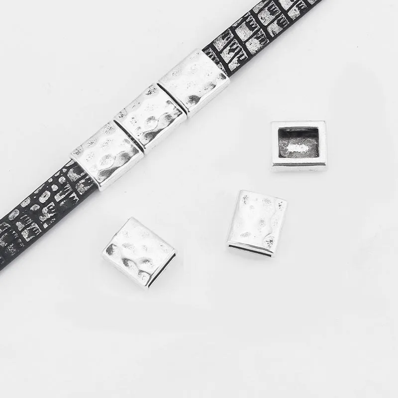 10 шт. тибетский серебряный молотковый полый плоский фотоэлемент для DIY 10x2 мм кожаный шнур браслет ожерелье ювелирные изделия
10 шт. тибетский серебряный молотковый полый плоский фотоэлемент для DIY 10x2 мм кожаный шнур браслет ожерелье ювелирные изделия