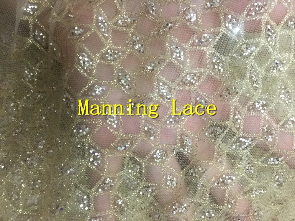 Hot selling glued glitter sequins lace fabric high quality African French net tulle Lace Fabric for party in gold color
Hot selling glued glitter sequins lace fabric high quality African French net tulle Lace Fabric for party in gold color