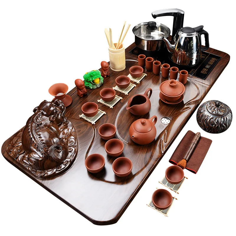 Semi-automatic Lazy Zisha Kungfu Tea Set Solid Wood Tea Plate Four in One Electromagnetic Furnace Set
Semi-automatic Lazy Zisha Kungfu Tea Set Solid Wood Tea Plate Four in One Electromagnetic Furnace Set