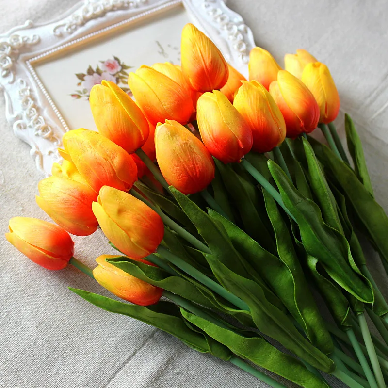 Tulip simulation flower home wedding decoration mini PU handfeel flower tulip artificial bouquet bride holding christmas bouquet
Tulip simulation flower home wedding decoration mini PU handfeel flower tulip artificial bouquet bride holding christmas bouquet