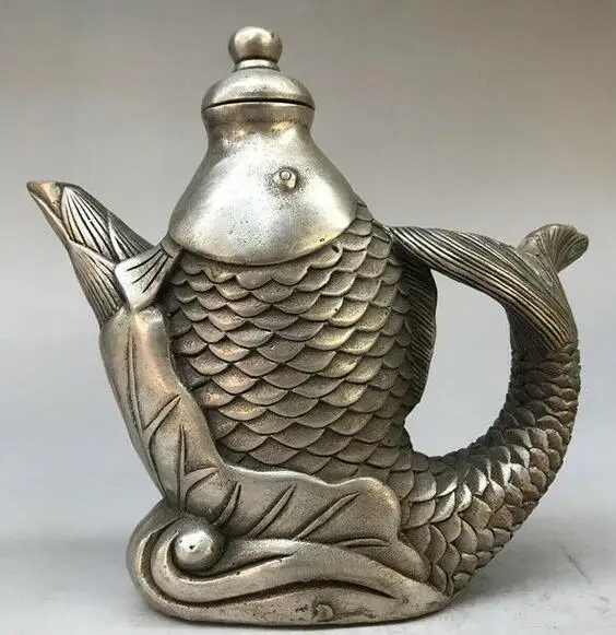 Chinese Collection Tibetan Silver Copper Hand-carved Fish Water Pot Teapot Wine Pot Bottles Animal Statue
Chinese Collection Tibetan Silver Copper Hand-carved Fish Water Pot Teapot Wine Pot Bottles Animal Statue