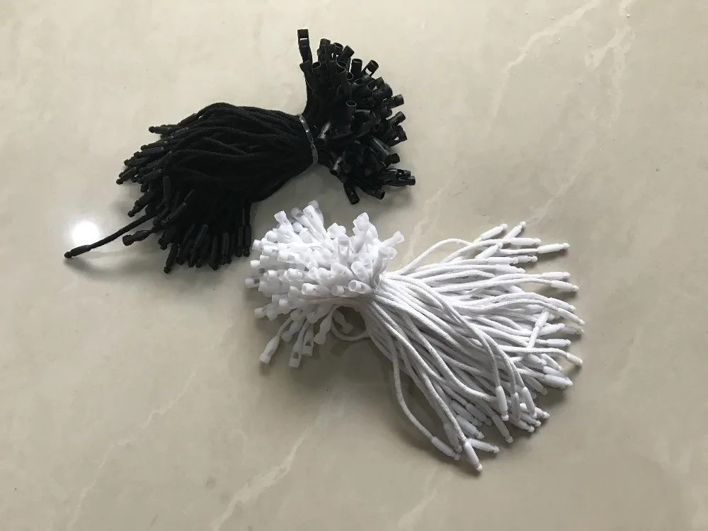 New in stock Good quality 10cm white cotton hang tag string for garment in apparel seal price plug Loop lock cord bullet head
New in stock Good quality 10cm white cotton hang tag string for garment in apparel seal price plug Loop lock cord bullet head