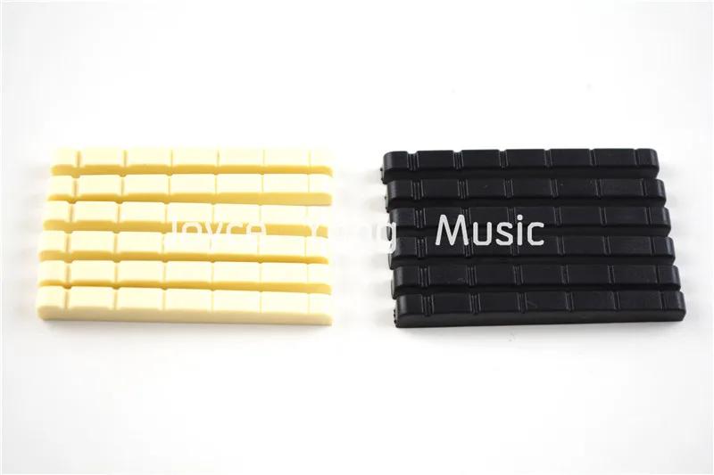 12pcs of Electric Guitar Nuts A028A Ivory&Black
12pcs of Electric Guitar Nuts A028A Ivory&Black