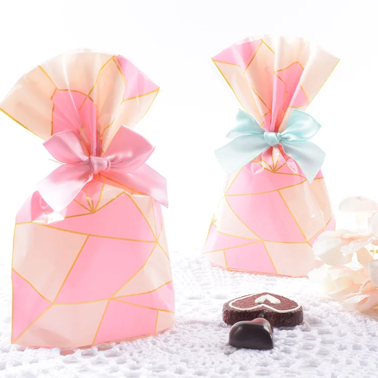 Hot Sale Wholesale 50pcs/lot Pink gold Packaging Bags valentine's day Plastic Small Gift Bags wedding decoration gift bag
Hot Sale Wholesale 50pcs/lot Pink gold Packaging Bags valentine's day Plastic Small Gift Bags wedding decoration gift bag