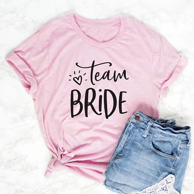 Team Bride Letter Print T-shirt Graphic Bridal Wedding Party T shirts Ladies Stylish Summer Funny Cotton Tees Tops Plus Size
Team Bride Letter Print T-shirt Graphic Bridal Wedding Party T shirts Ladies Stylish Summer Funny Cotton Tees Tops Plus Size