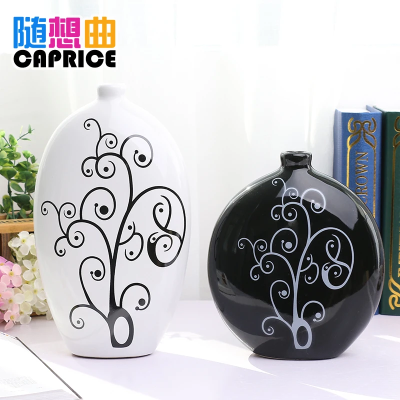 Ceramic vase ornaments modern minimalist fashion decoration flower pot round black and white vase Home Furnishing Decor
Ceramic vase ornaments modern minimalist fashion decoration flower pot round black and white vase Home Furnishing Decor