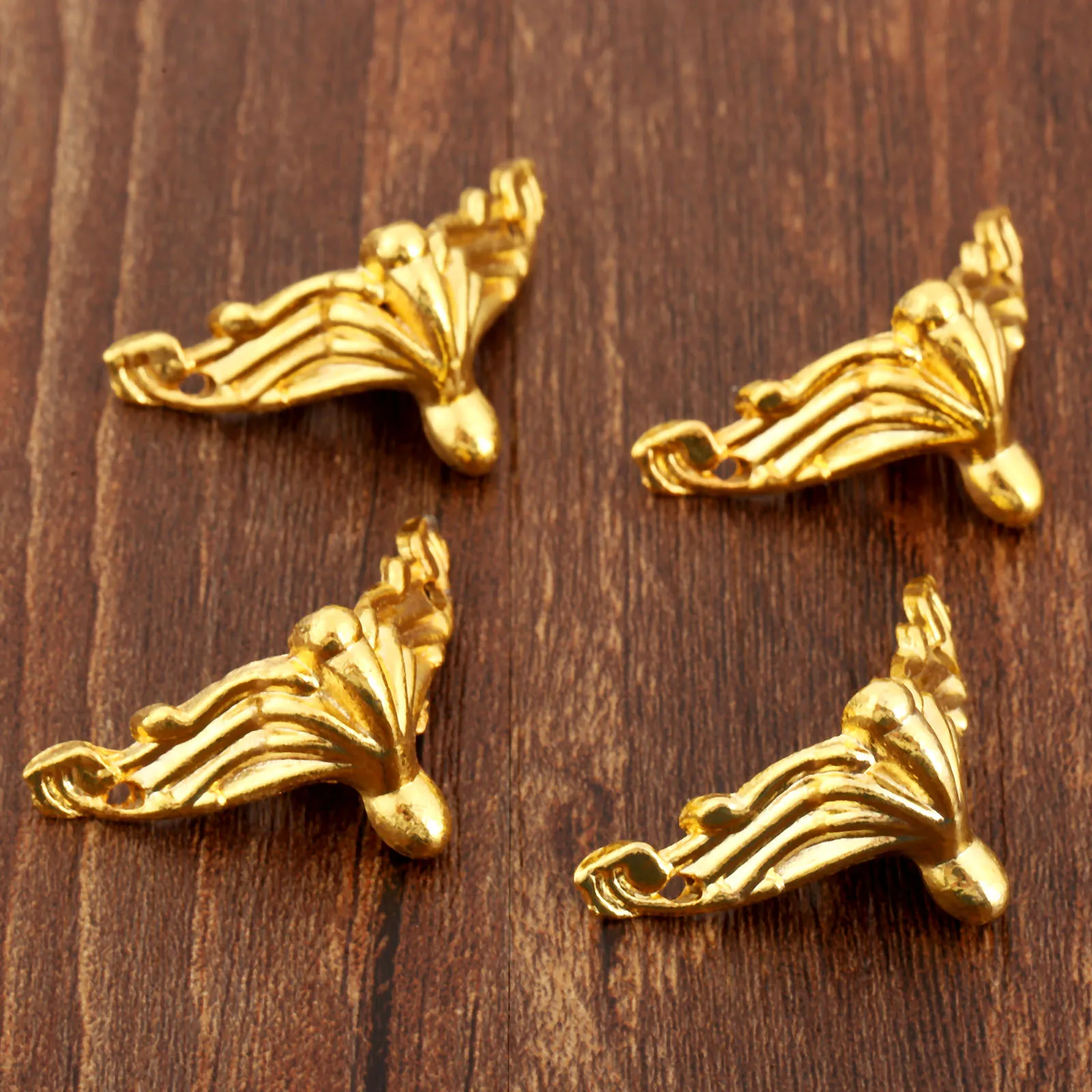 4Pcs Gold Decorative Corner Bracket for furniture Jewelry Gift Wooden Box Feet Furniture Foot Corner Protector 26*19mm
4Pcs Gold Decorative Corner Bracket for furniture Jewelry Gift Wooden Box Feet Furniture Foot Corner Protector 26*19mm
