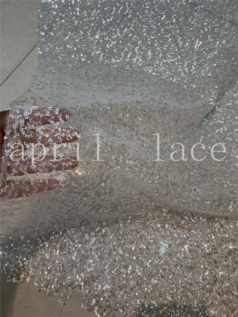 5yards/lot K45# good quality shining silver sequin embroidery lace tulle fabric for sawing bridal wedding dress/occasion
5yards/lot K45# good quality shining silver sequin embroidery lace tulle fabric for sawing bridal wedding dress/occasion