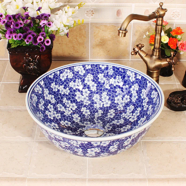 Blue and white Jingdezhen factory directly art hand painted ceramic wash basin round bowl sink
Blue and white Jingdezhen factory directly art hand painted ceramic wash basin round bowl sink