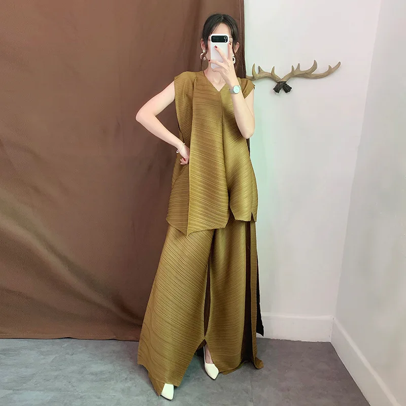 Women Pleated Fashion New Irregular Sleeveless Vest Loose Leggings Two-piece Clothing Sets
Women Pleated Fashion New Irregular Sleeveless Vest Loose Leggings Two-piece Clothing Sets