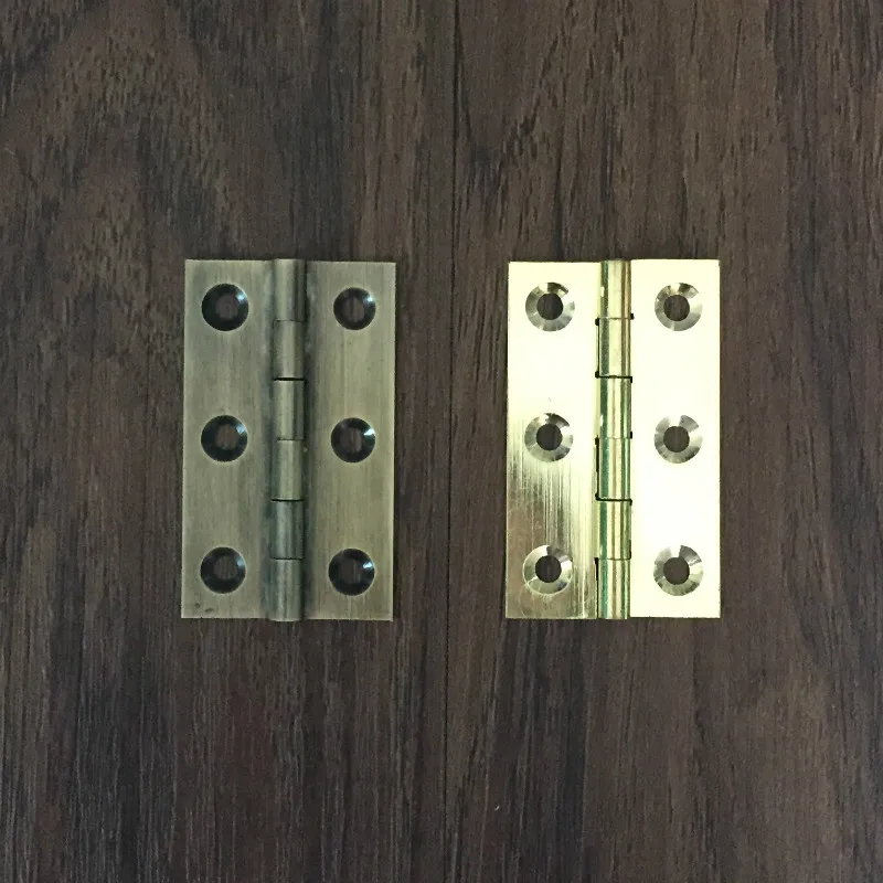2 inch inch copper hinge hinge roll leather concealed hinge Chinese antique furniture copper fittings 
2 inch inch copper hinge hinge roll leather concealed hinge Chinese antique furniture copper fittings