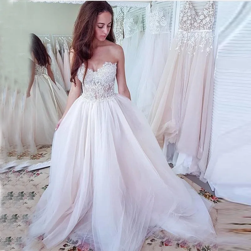 2019 Simple Illusion Bodice Beach A-line Bridal Gowns Sweetheart Lightweight Wedding Dresses Appliques Beaded Bridal Dresses
2019 Simple Illusion Bodice Beach A-line Bridal Gowns Sweetheart Lightweight Wedding Dresses Appliques Beaded Bridal Dresses