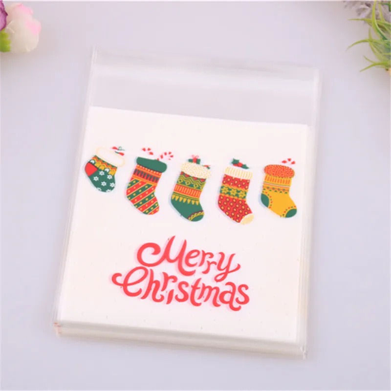 New Design 100pcs/lot 10x13cm Baking Cookie Packing Bags for Merry Christmas Candy Packaging With Santa Socks for Gift
New Design 100pcs/lot 10x13cm Baking Cookie Packing Bags for Merry Christmas Candy Packaging With Santa Socks for Gift