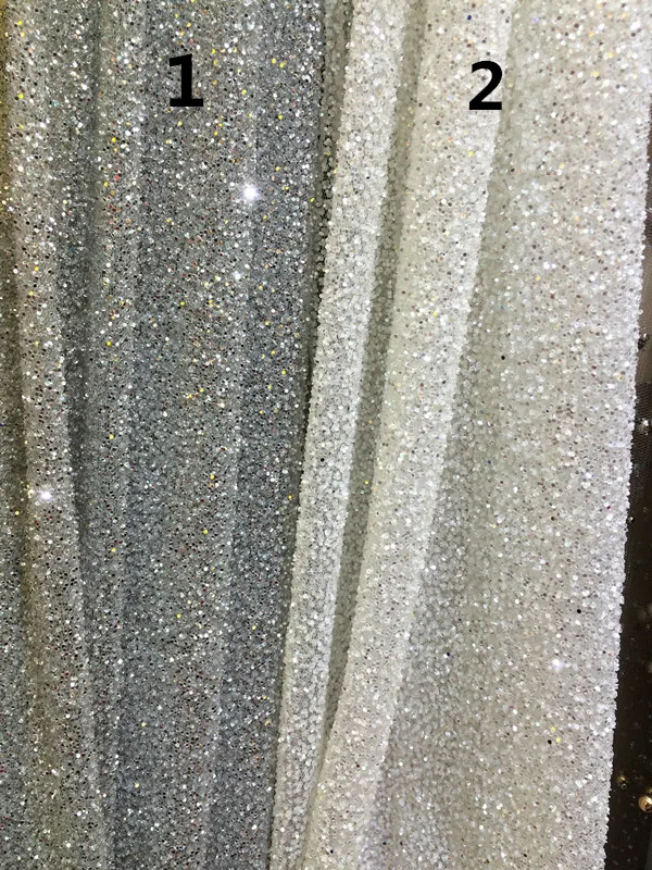 high quality french tulle lace fabric African sequins net lace S-11294 glitter fabric for wedding dress
high quality french tulle lace fabric African sequins net lace S-11294 glitter fabric for wedding dress