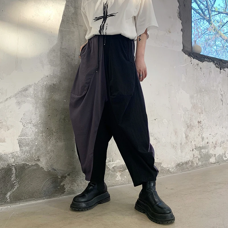 Men's new summer asymmetric color splicing design of Japanese casual loose large size bloomers
Men's new summer asymmetric color splicing design of Japanese casual loose large size bloomers