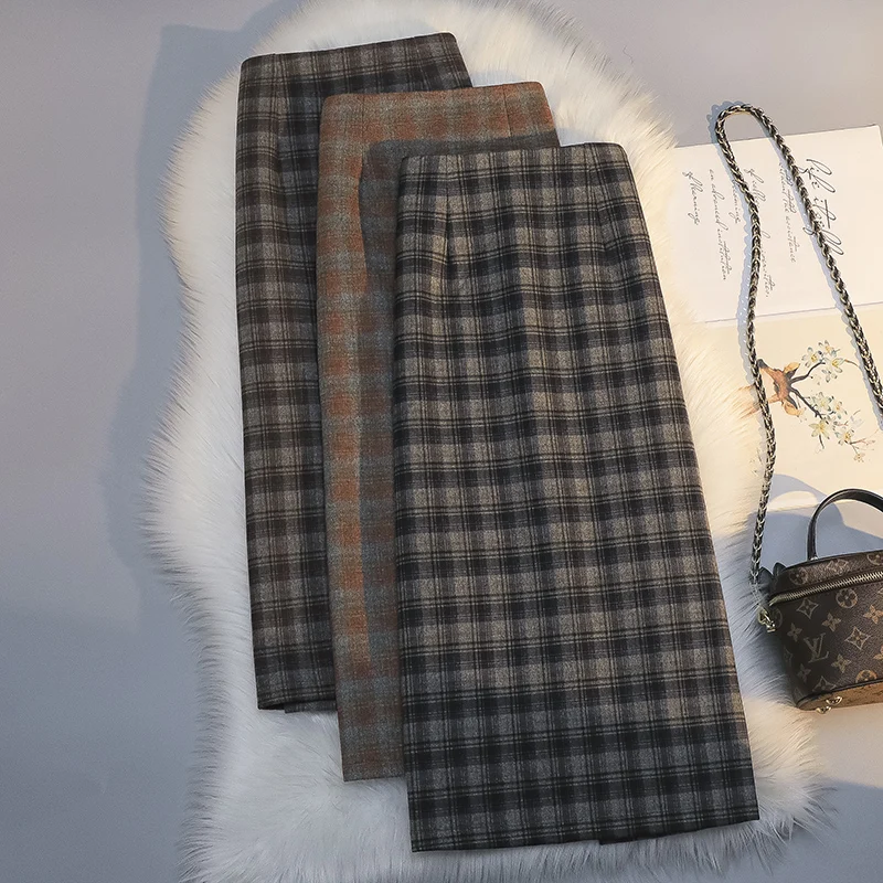 Contrasting color woolen plaid skirt women 2022 autumn winter split high waist one-step package hip skirt
Contrasting color woolen plaid skirt women 2022 autumn winter split high waist one-step package hip skirt