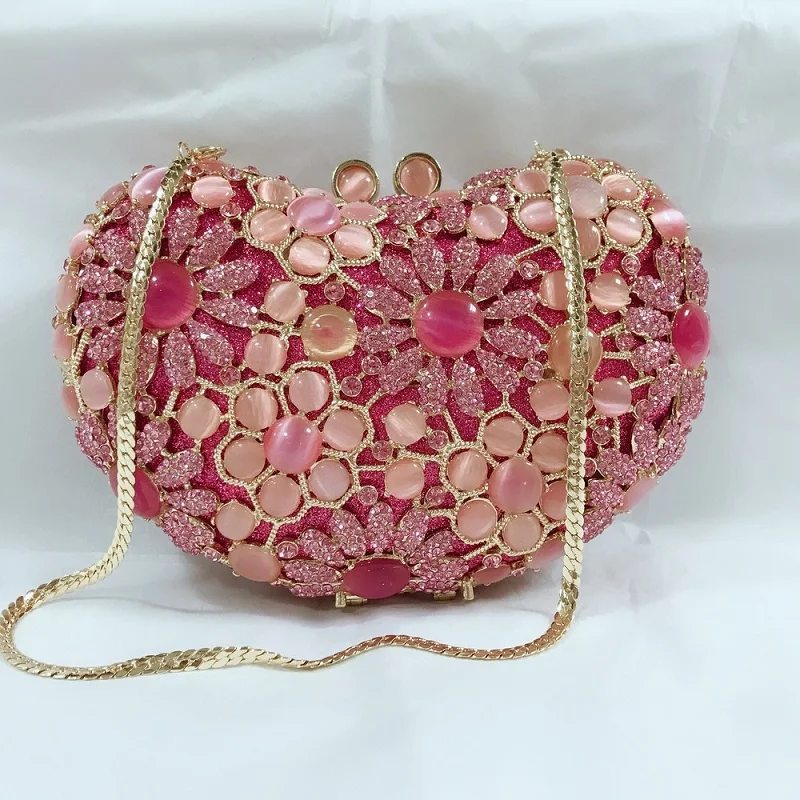 Spring heart-shaped cat's eye diamond wispy metal crystal evening bag handmade diamond dress one-shoulder messenger female bag
Spring heart-shaped cat's eye diamond wispy metal crystal evening bag handmade diamond dress one-shoulder messenger female bag