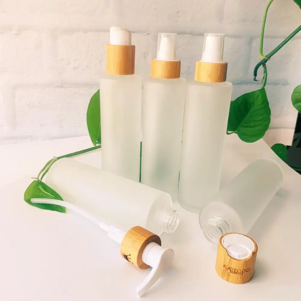 88pcs/lot 100ml frosted glass bottle empty cosmetic containers glass jar with bamboo lid lotion bottles with pump
88pcs/lot 100ml frosted glass bottle empty cosmetic containers glass jar with bamboo lid lotion bottles with pump