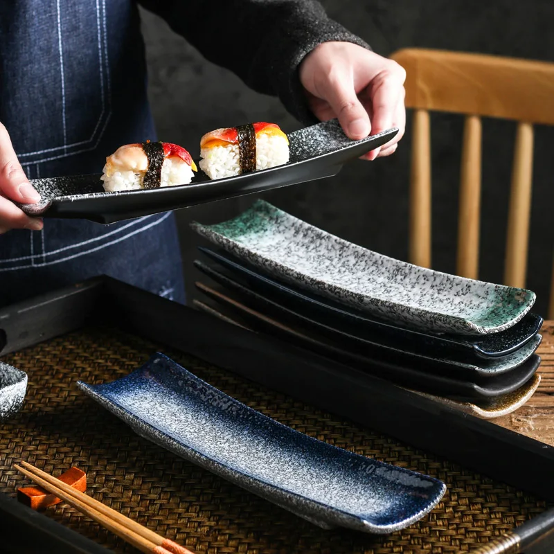 Japanese ceramic creative boat board sushi board style leaf sashimi board Japanese tableware.
Japanese ceramic creative boat board sushi board style leaf sashimi board Japanese tableware.